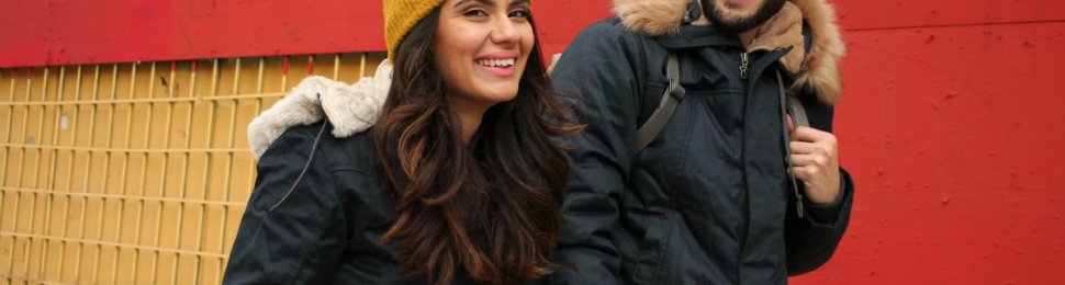 Two people wearing vegan coats