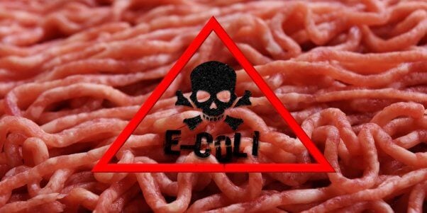 e coli warning sign on top of a photo of ground beef