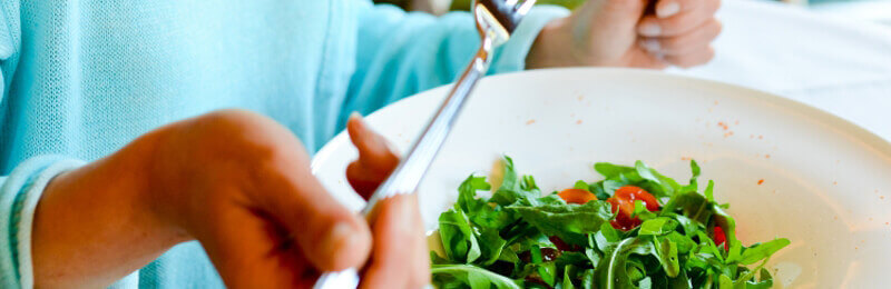 Woman eating healthy salad