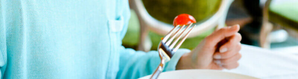 Woman eating healthy salad