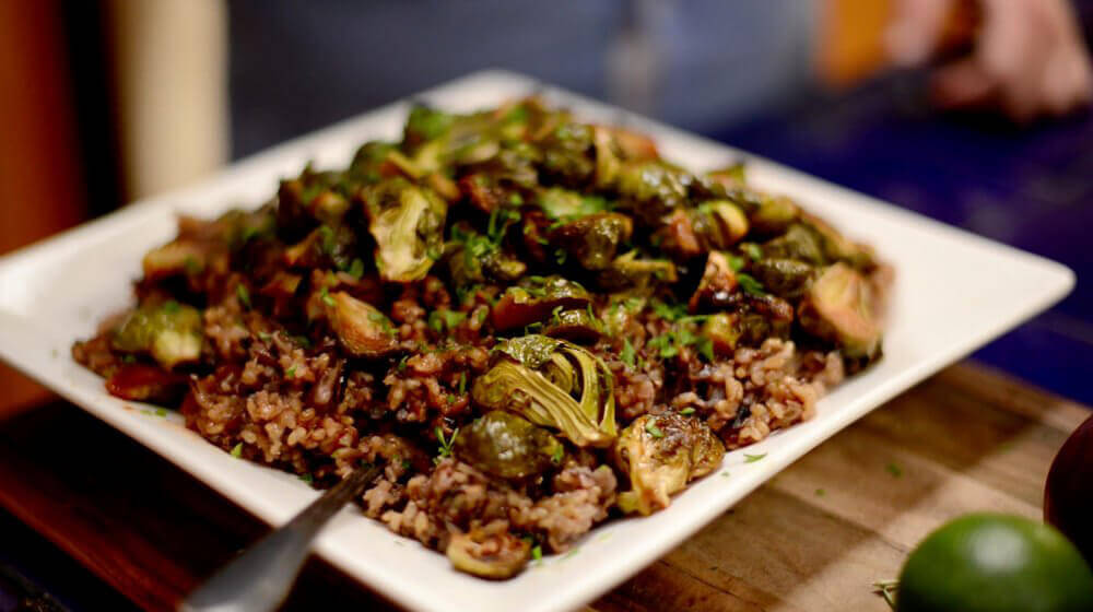 Maple-Sriracha Roasted Brussels Sprouts With Cranberry Wild Rice (Video)