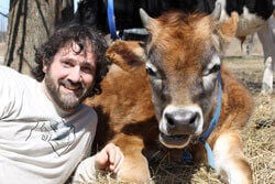 Teacher Keith Allison With Cow