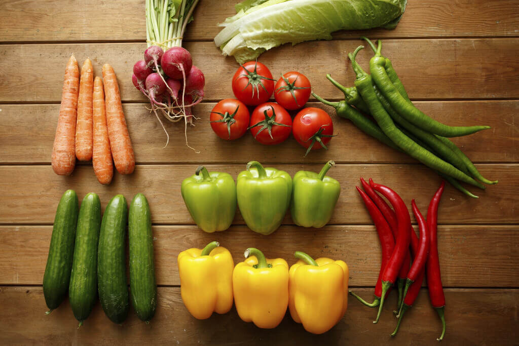 Vegan Veggies vegetables on wood