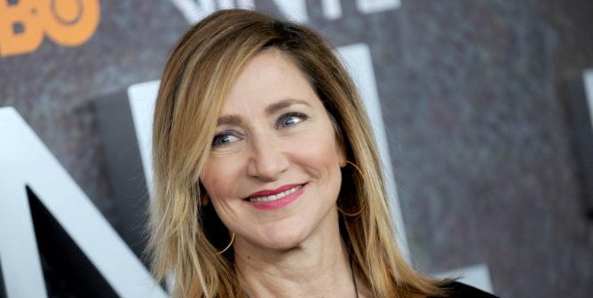 edie falco smiling at event