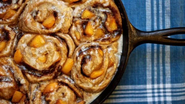 Cinnamon Peach Skillet Rolls with Peach Glaze
