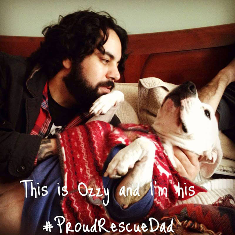 Proud-Rescue-Dad-with-Pitbull-Puppy