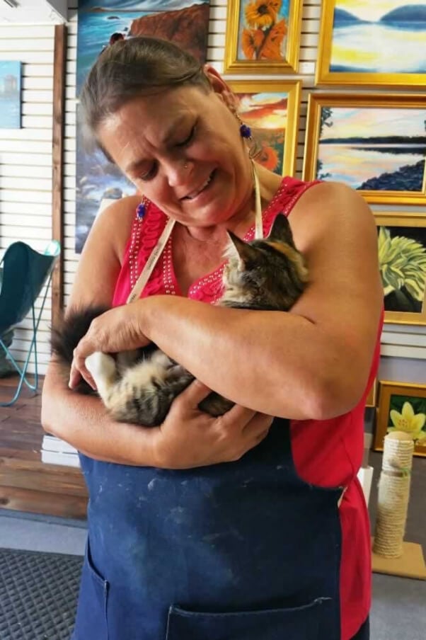 Woman holding cat