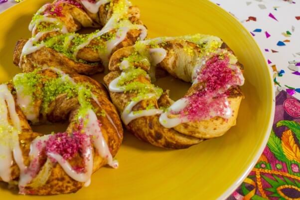 Purple, Yellow, and Green Sprinkles on Mini King Cake - Vegan