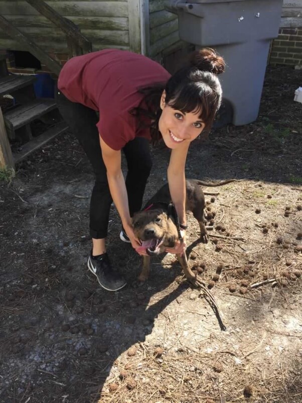 PETA fieldworker with backyard dog