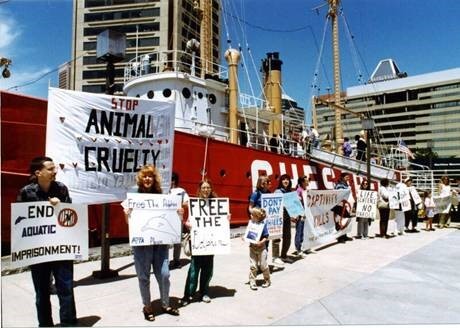 PETA protesters lead a demonstration at the National Aquarium in the 1990s. 