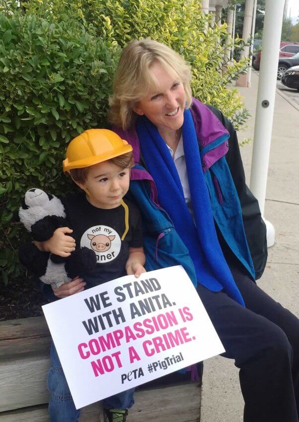 Ingrid with a young activist at Toronto Pig Save demo