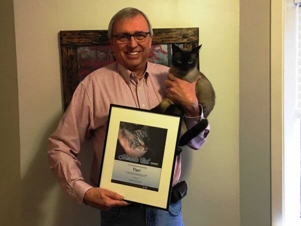 Mark Burger with hero cat Tiger