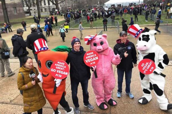 PETA carrot mascot being interviewed at 2017 inauguration
