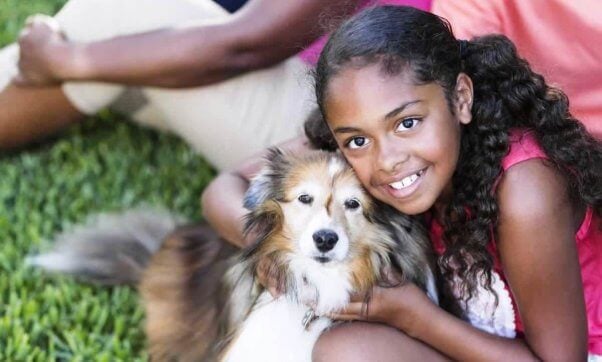 Young girl with dog