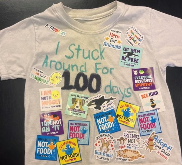 !00th Day of School shirt covered in animal rights stickers