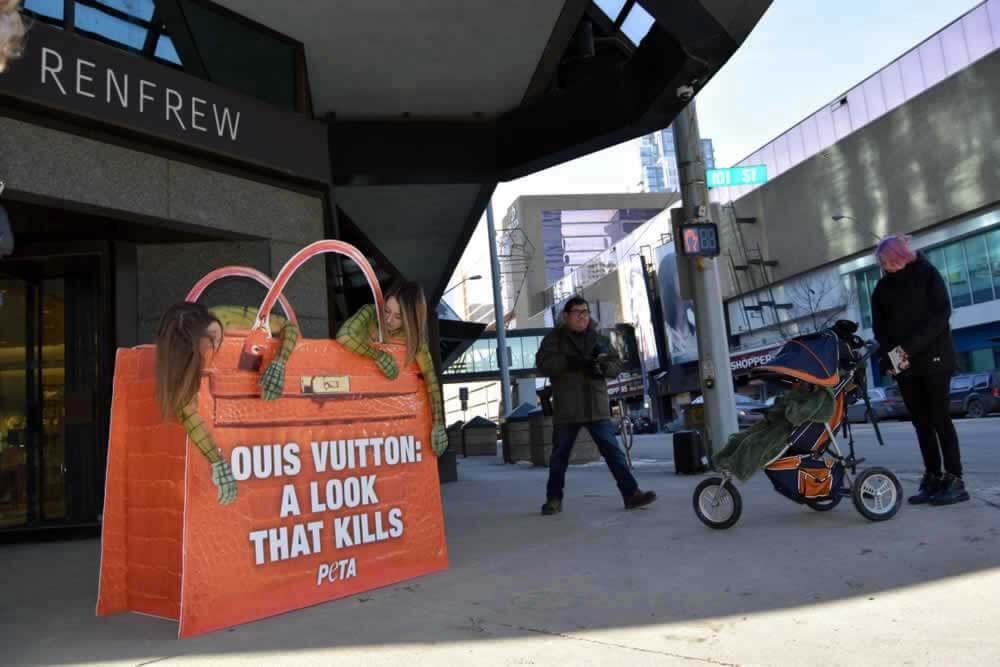 Bodypainted &#39;Crocodiles&#39; Crawl Out of Giant Louis Vuitton Bag and &#39;Die&#39; | PETA