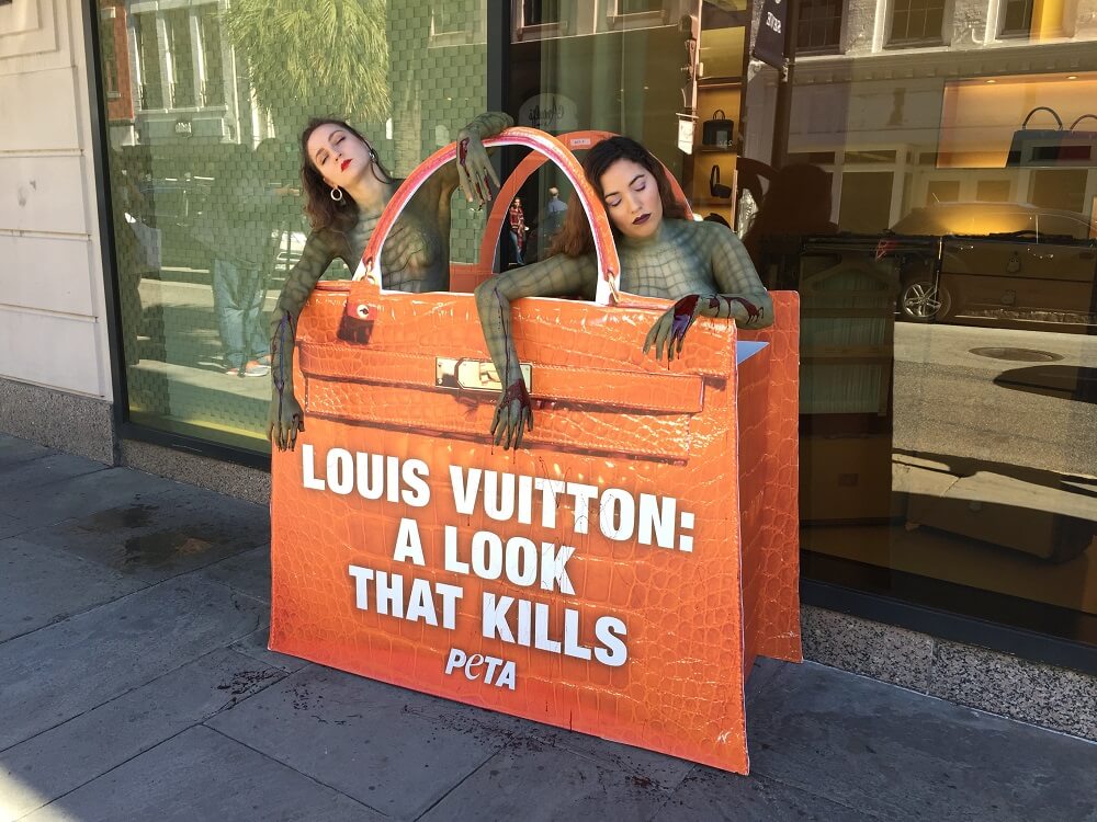 Passers-By Gasp at Naked &#39;Crocodiles&#39; Outside Louis Vuitton Store | PETA