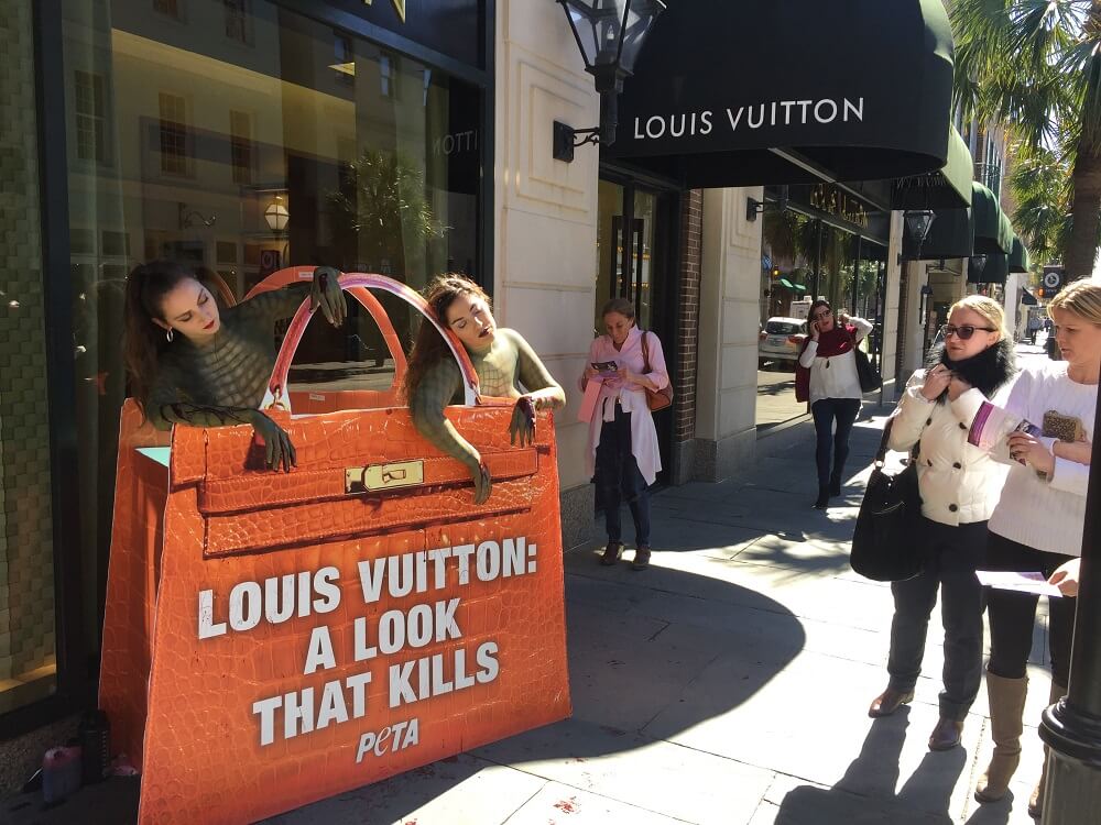 Passers-By Gasp at Naked &#39;Crocodiles&#39; Outside Louis Vuitton Store | PETA
