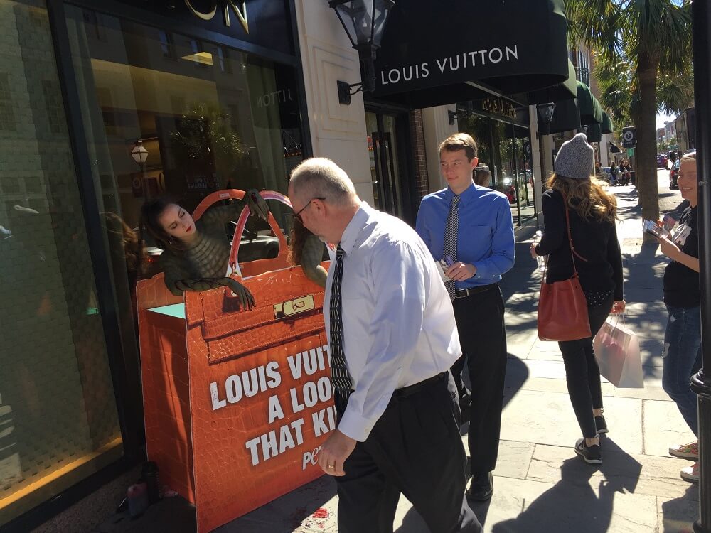 Passers-By Gasp at Naked &#39;Crocodiles&#39; Outside Louis Vuitton Store | PETA