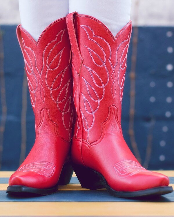 Woman Wearing Cowboy Boots from Western Wear Clothing Campaign