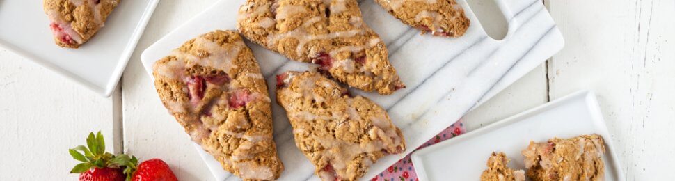 Vegan Strawberry Lemon Scones on white plates on a table