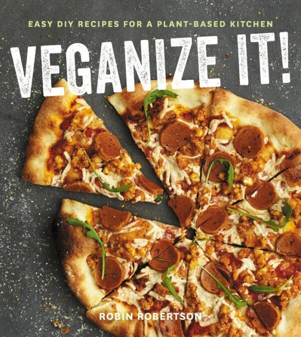 Vegan pizza on the cover of Veganize It! cookbook