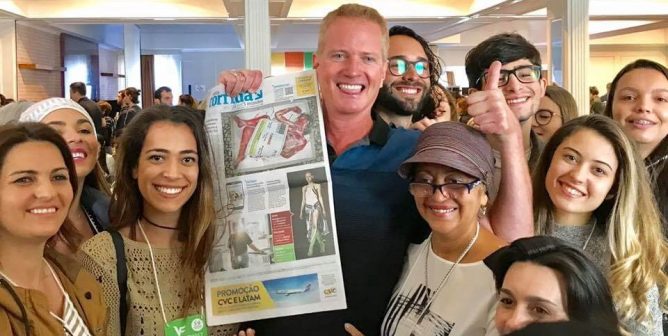 Dan Mathews, Brazil, VegFest, meat tray demo, front page of newspaper