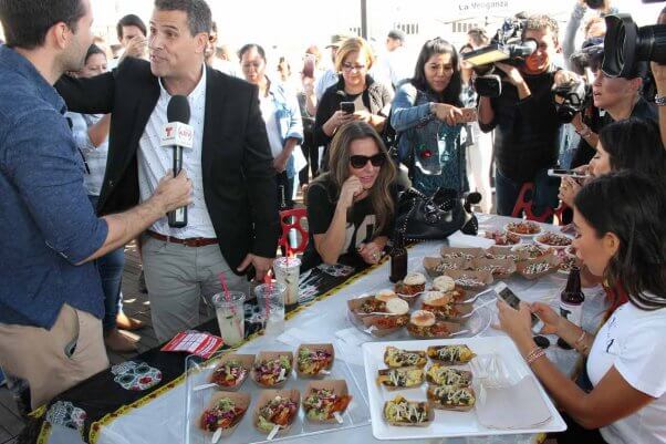 the cameras are out at PETA's vegan chilaquiles cook-off event