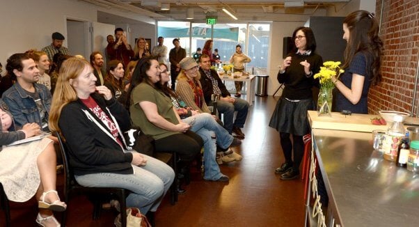 Crowd watching Chef Chloe cooking demo at PETA LA offices