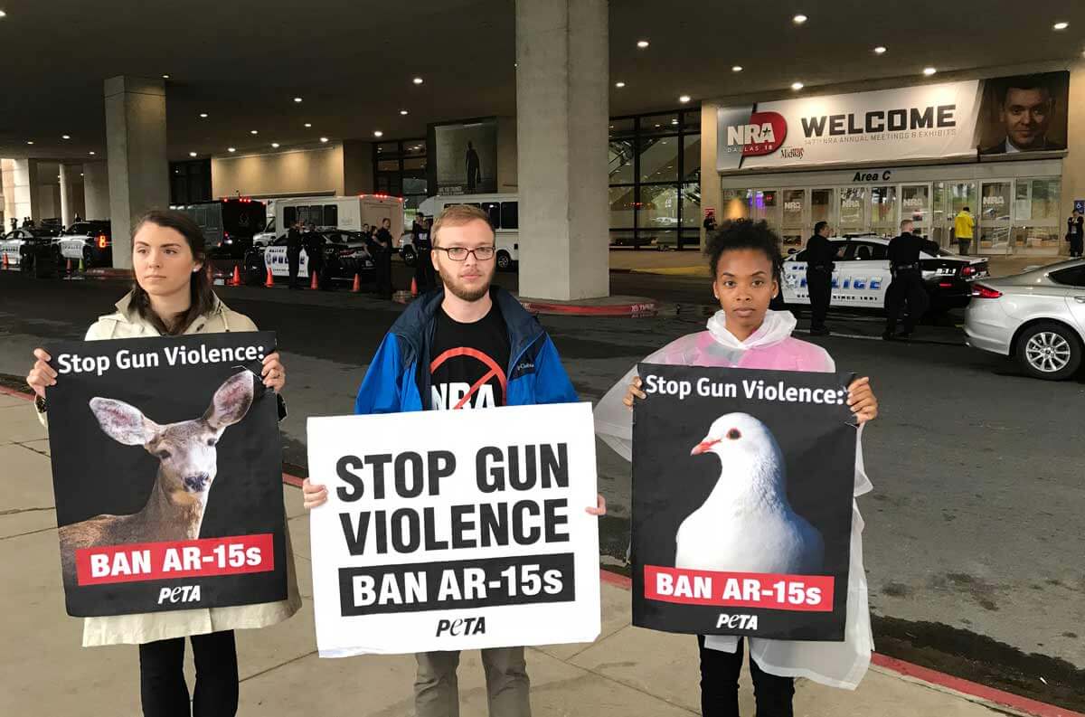 peta members stare down the NRA