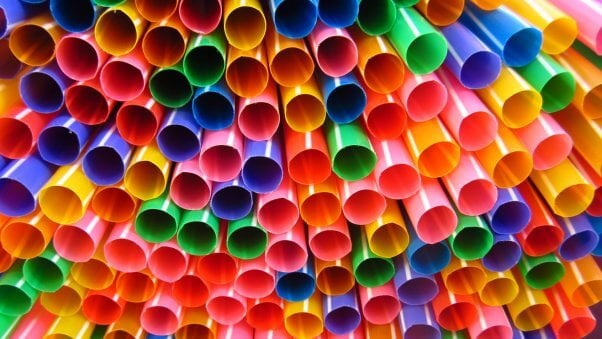 colorful plastic straws in the ocean