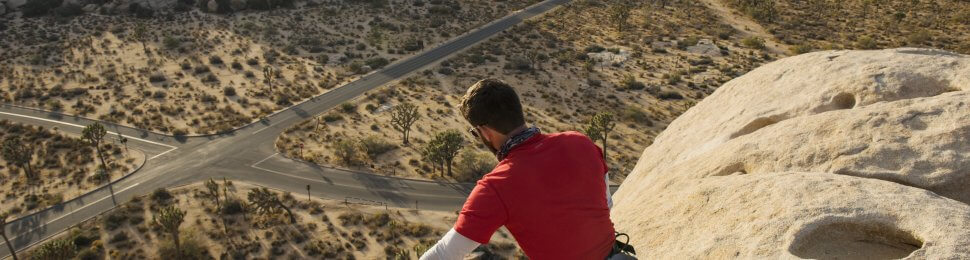 Image of man rock climbing