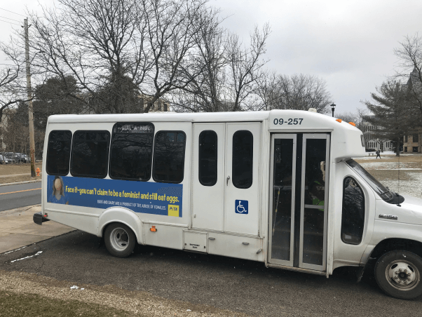 Egg Eating Feminist Bus Ad in Oberlin Ohio