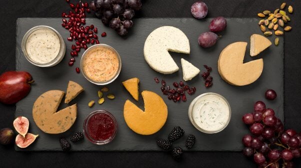 Vegan Stokes Cheese wheels on a plate