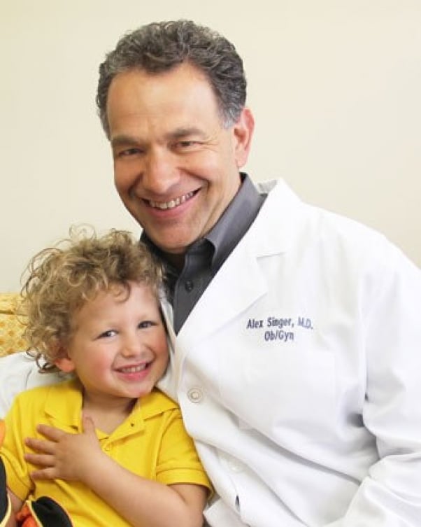 Vegan doctor Alex Singer with his son