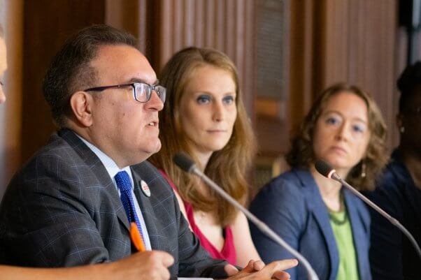 PETA scientist Dr. Amy Clippinger sits next to EPA Administrator Andrew Wheeler