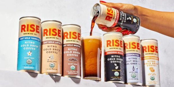 RISE brewing canned oat milk lattes