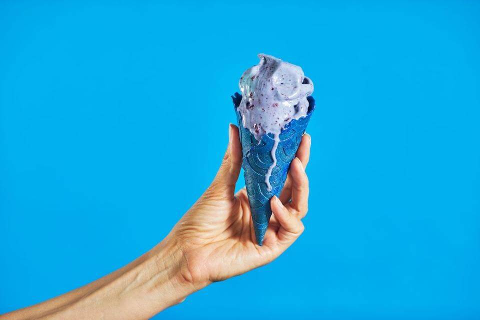 eclipse ice cream in blue cone with blue background