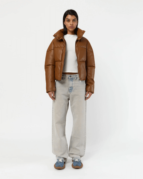 model wearing a brown apparis puffer jacket
