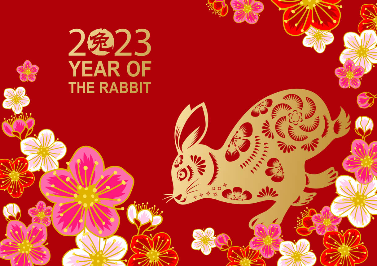 2023 year of the rabbit - papercut red and gold image of rabbit