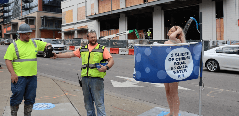 PETA girl 'showers' as construction workers take photos