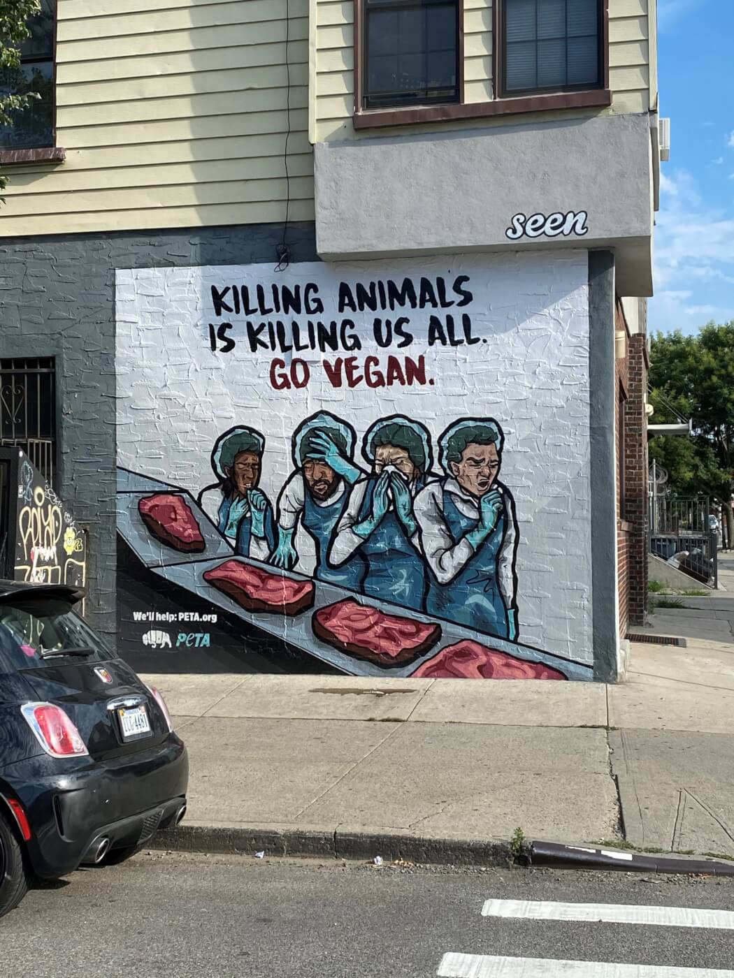 killing animals is killing us all mural in Brooklyn