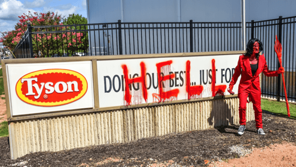 PETA "devil" in front of Tyson slaughterhouse