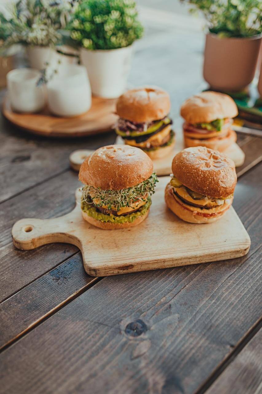 burgers on a cutting board