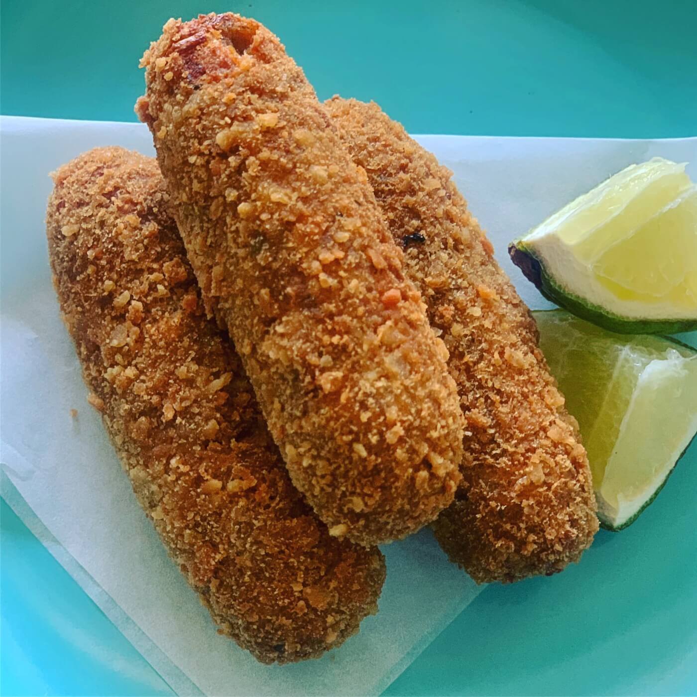 fried croquetas with lime