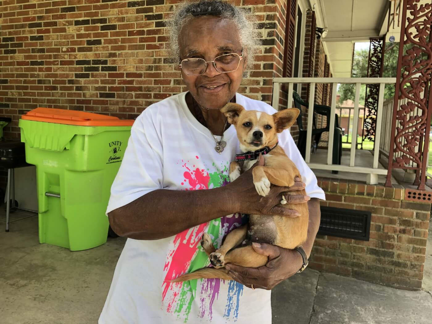 Penny and her owner after she was transported to and from a spay and neuter clinic free of charge.