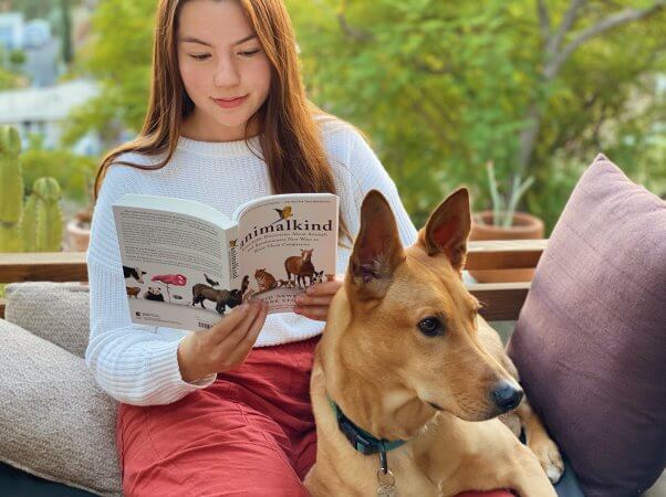 Animalkind reader and dog on couch