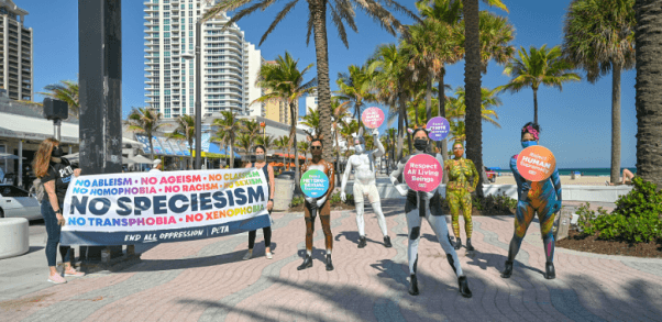 Bodypainted ‘Animals’ Lead Rally Against Injustice