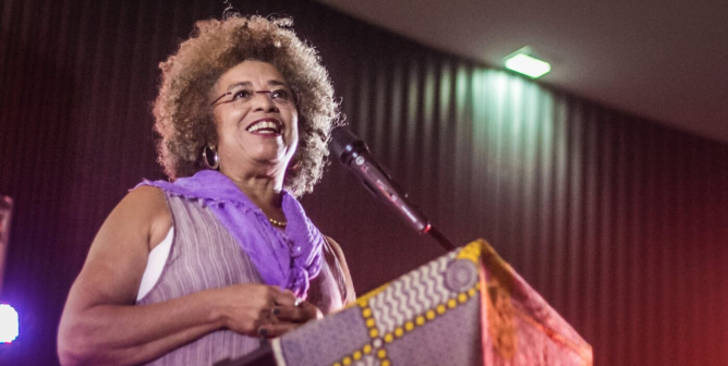 Angela Davis speaking at a conference