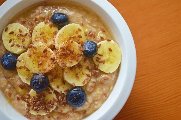 Oatmeal breakfast on a wooden table